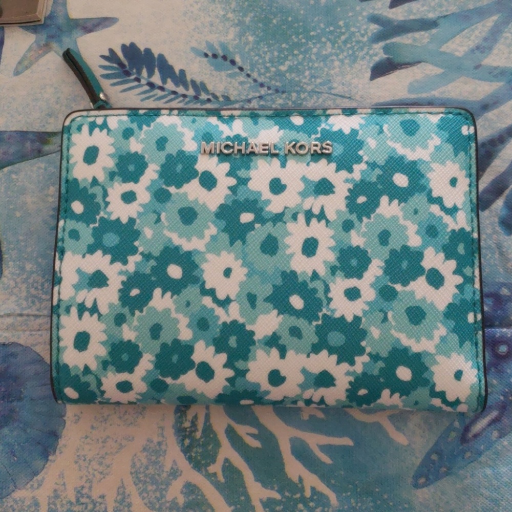 Michael kors money prices